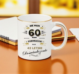 KUBEK PREMIUM NA 60 URODZINY BIAŁO-ZŁOTY ŚMIESZNY PREZENT
